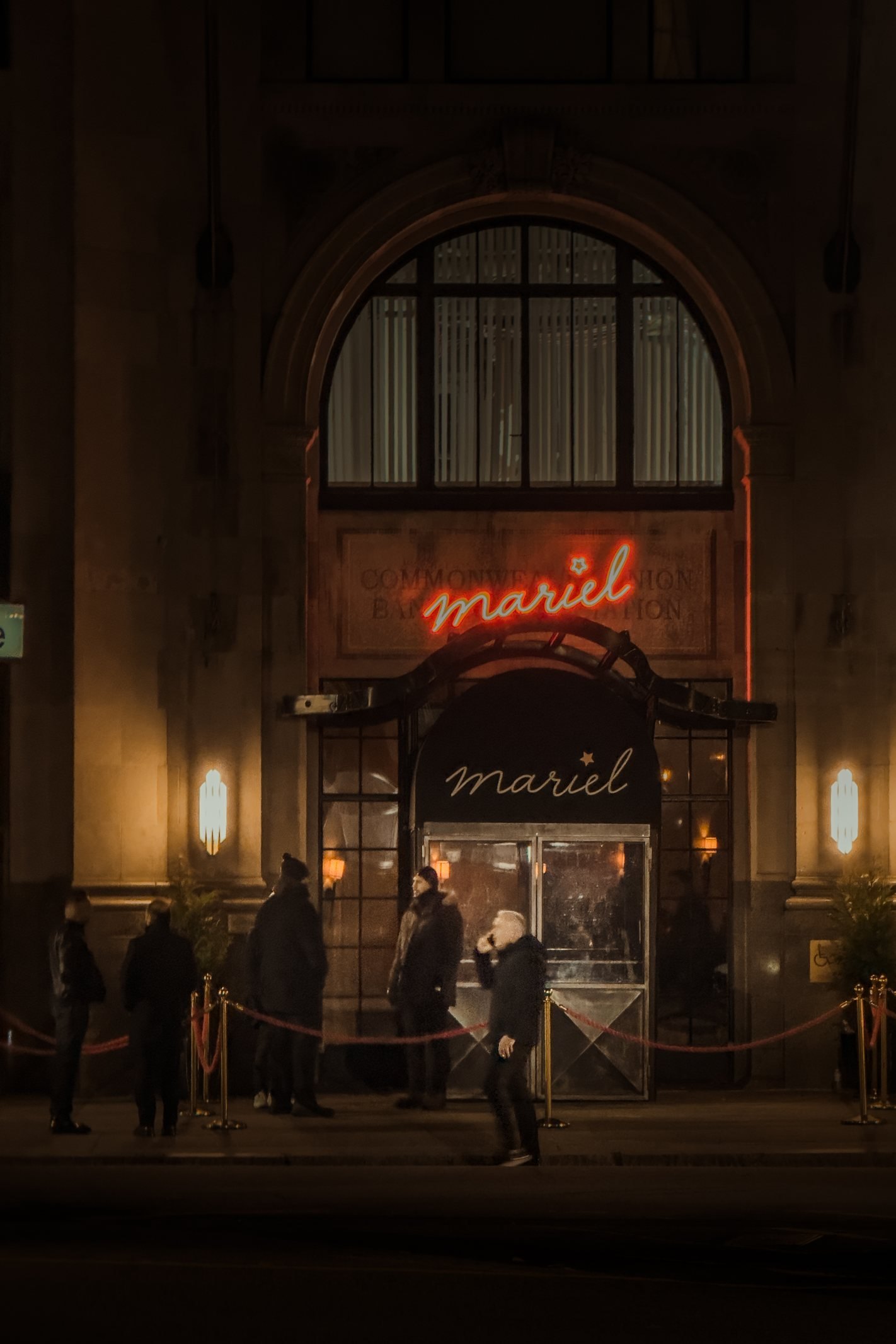 Restaurant entrance lit at night