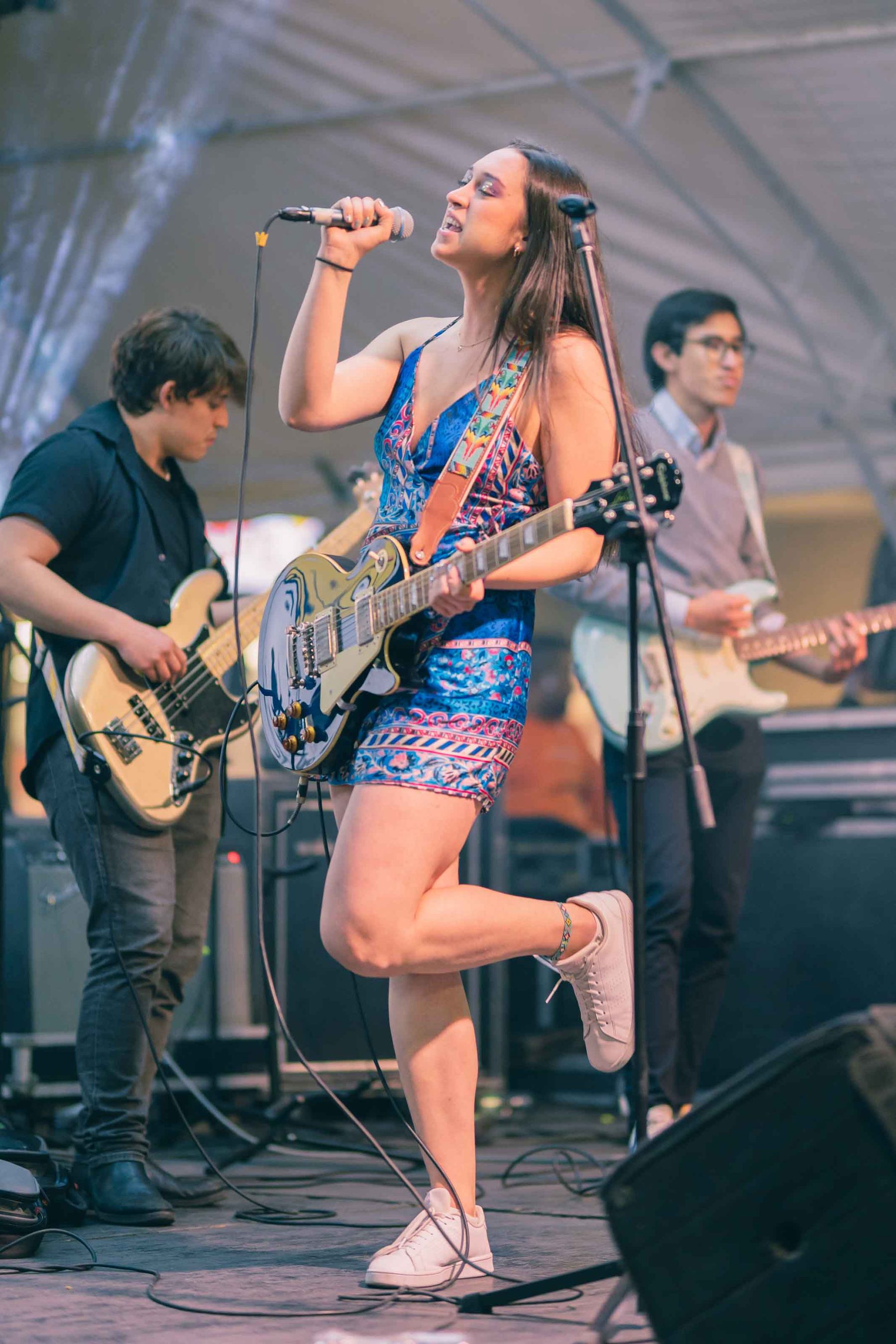 Singer on stage with her band