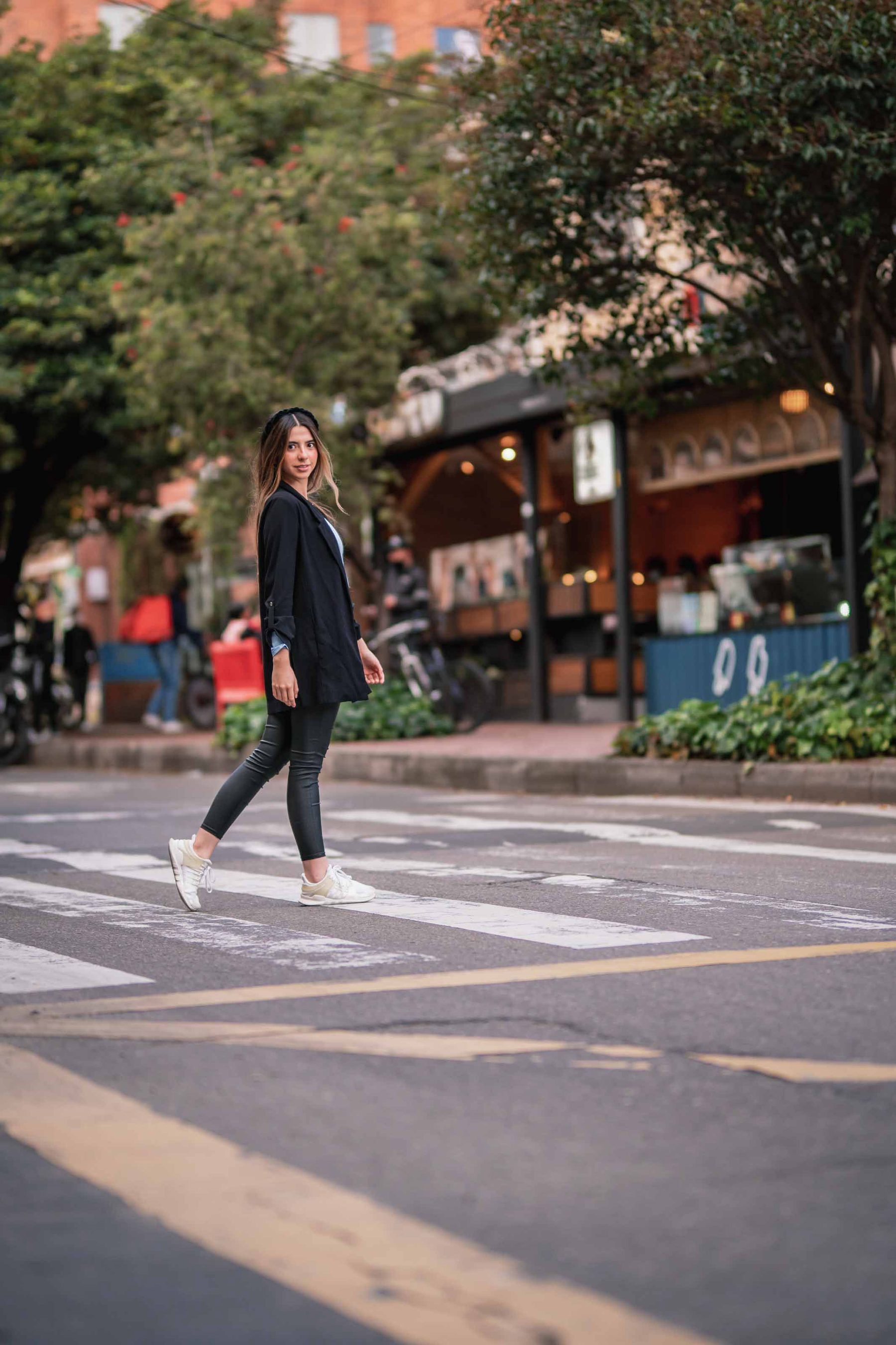 Woman crossing the street