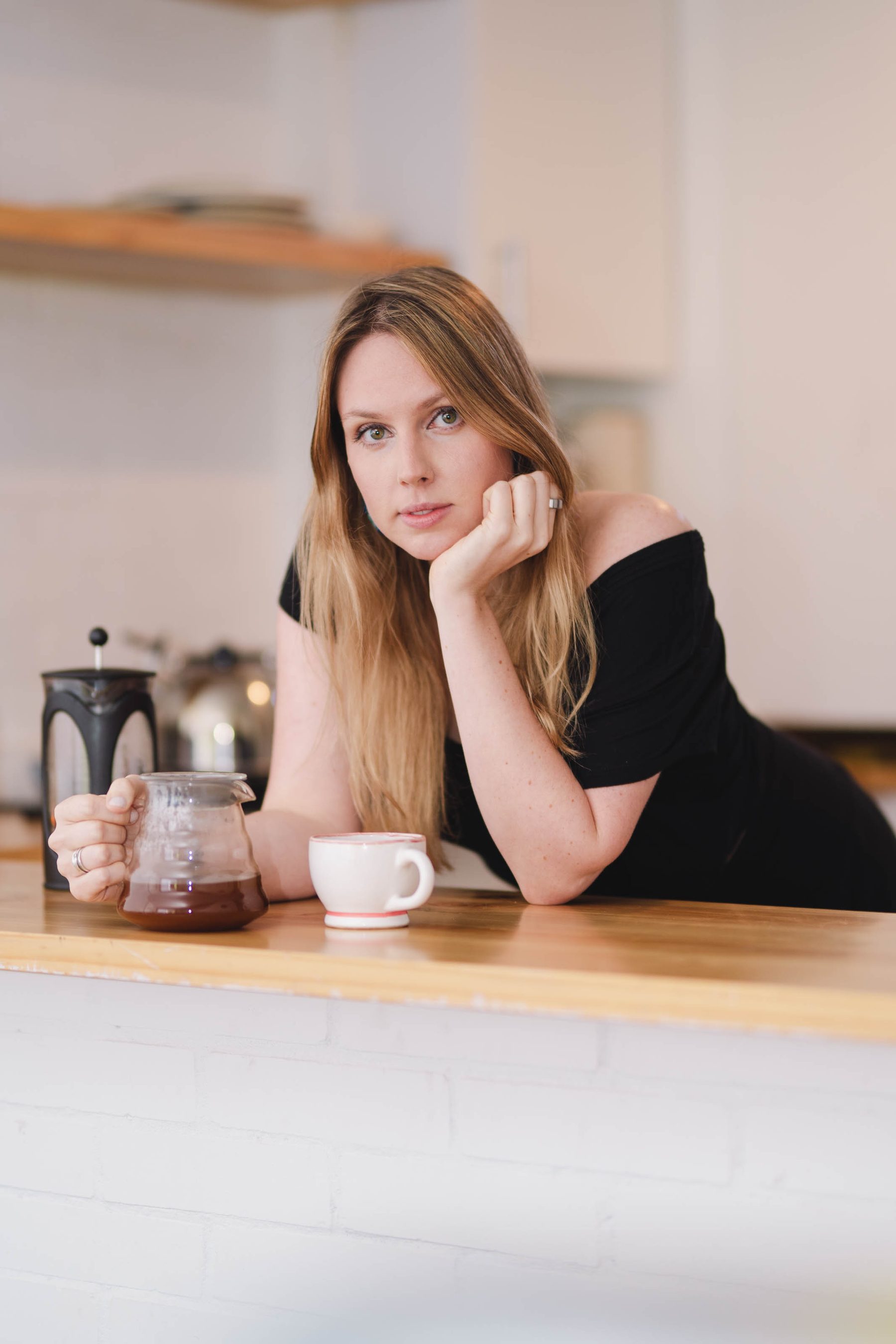Woman at a café counter