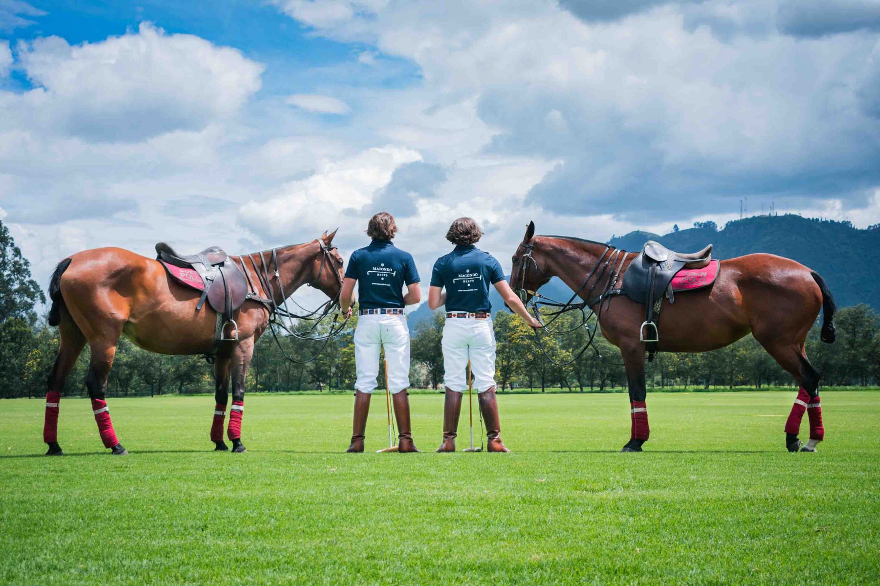 Polo riders lined up on their horses