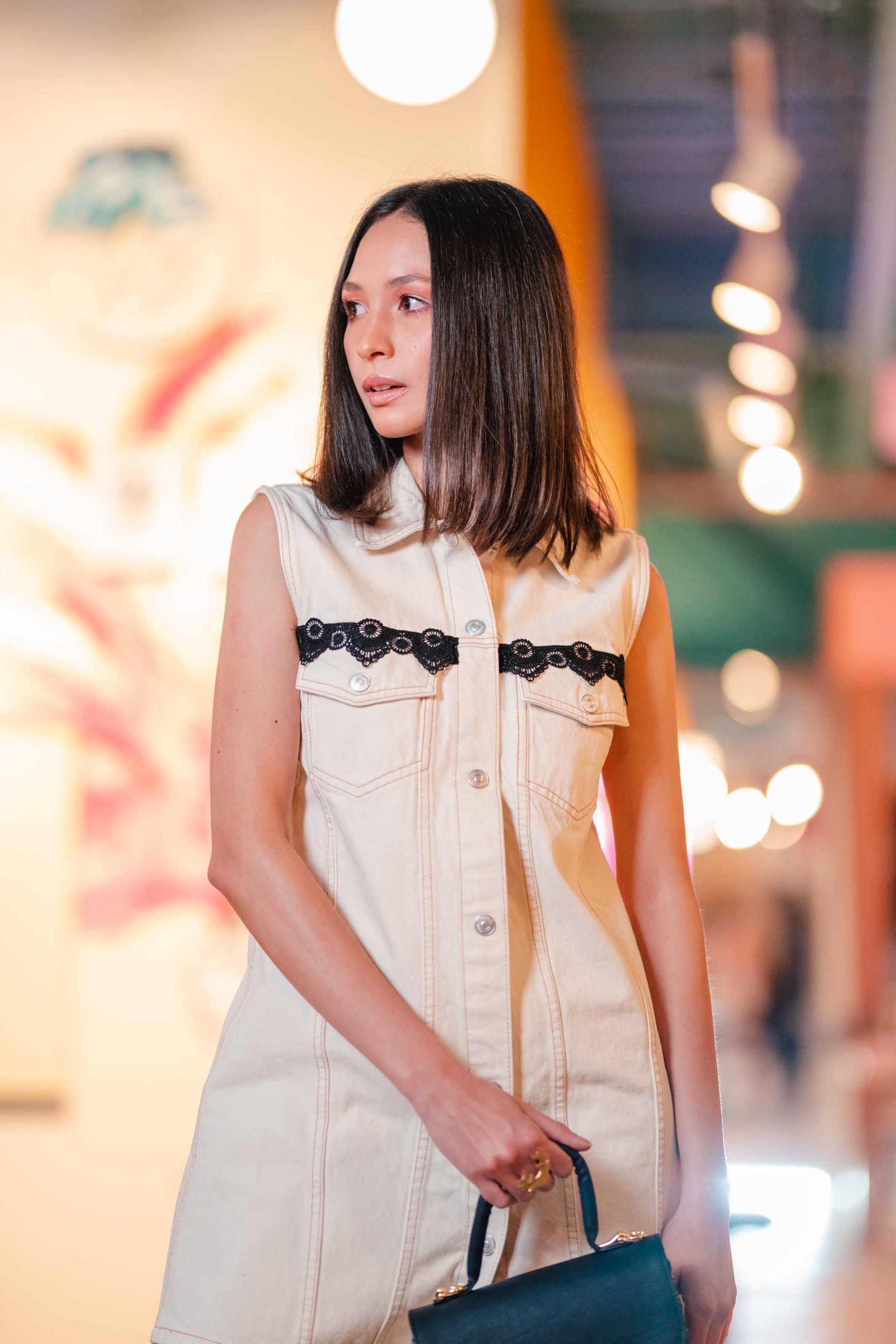 Model in white on the runway