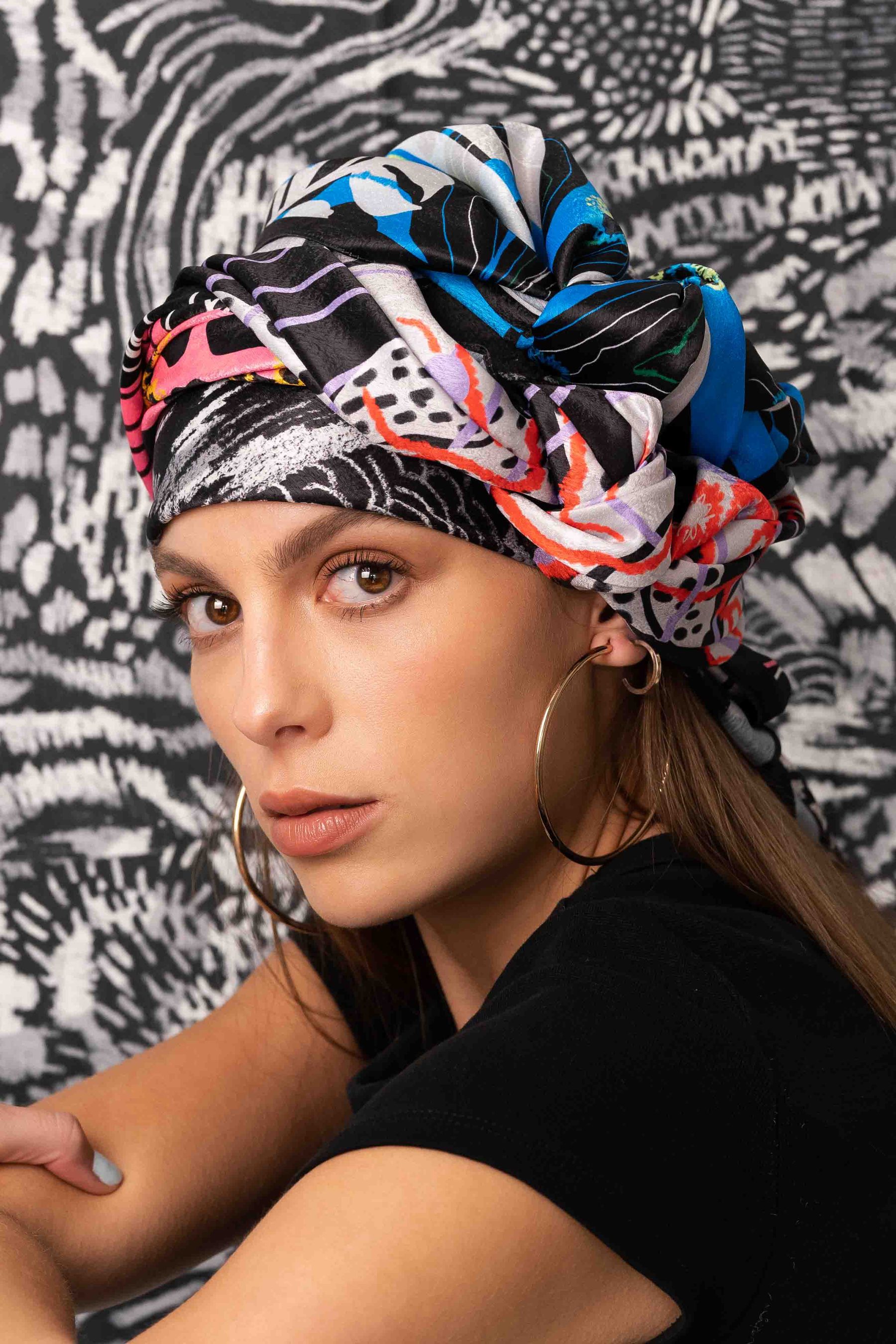 Model in a printed headscarf