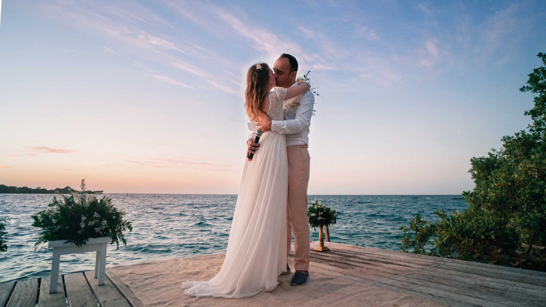 Couple kissing by the sea